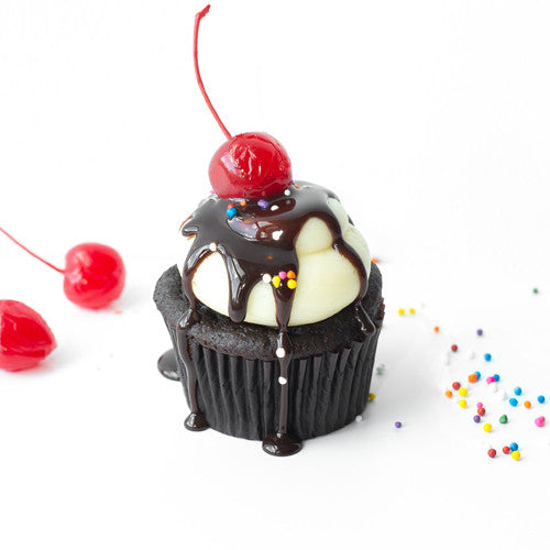 Single Sundae gourmet nut-free cupcake with vanilla frosting, sprinkles, cherry, and fudge filling for Toronto delivery.