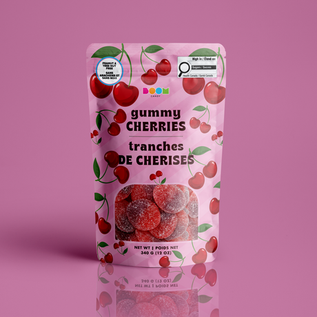 Cherries 340g candy package featuring a vibrant red and pink bag filled with cherry shaped chewy fruit sweets and confections from a 100% peanut and tree nut free facility.