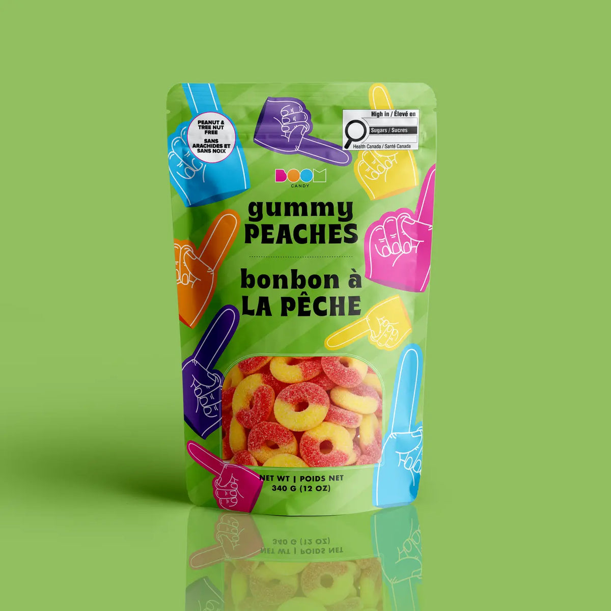 Sport Hands Gummies 340g package featuring a vibrant colour scheme of foam fingers. Filled with iconic peach rings from a 100% peanut and tree nut free facility.