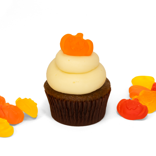 Single Pumpkin Spice gourmet nut-free cupcake with cream cheese frosting and pumpkin gummy for Toronto delivery.