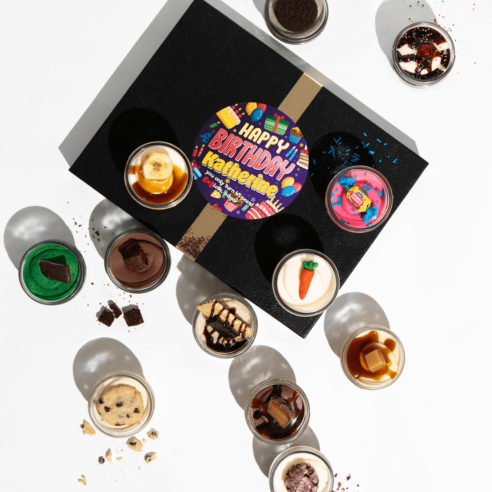 Birthday Dirty Dozen Jarcakes: 12 shippable nut-free cupcake jars in assorted gourmet flavors for birthday gifting.