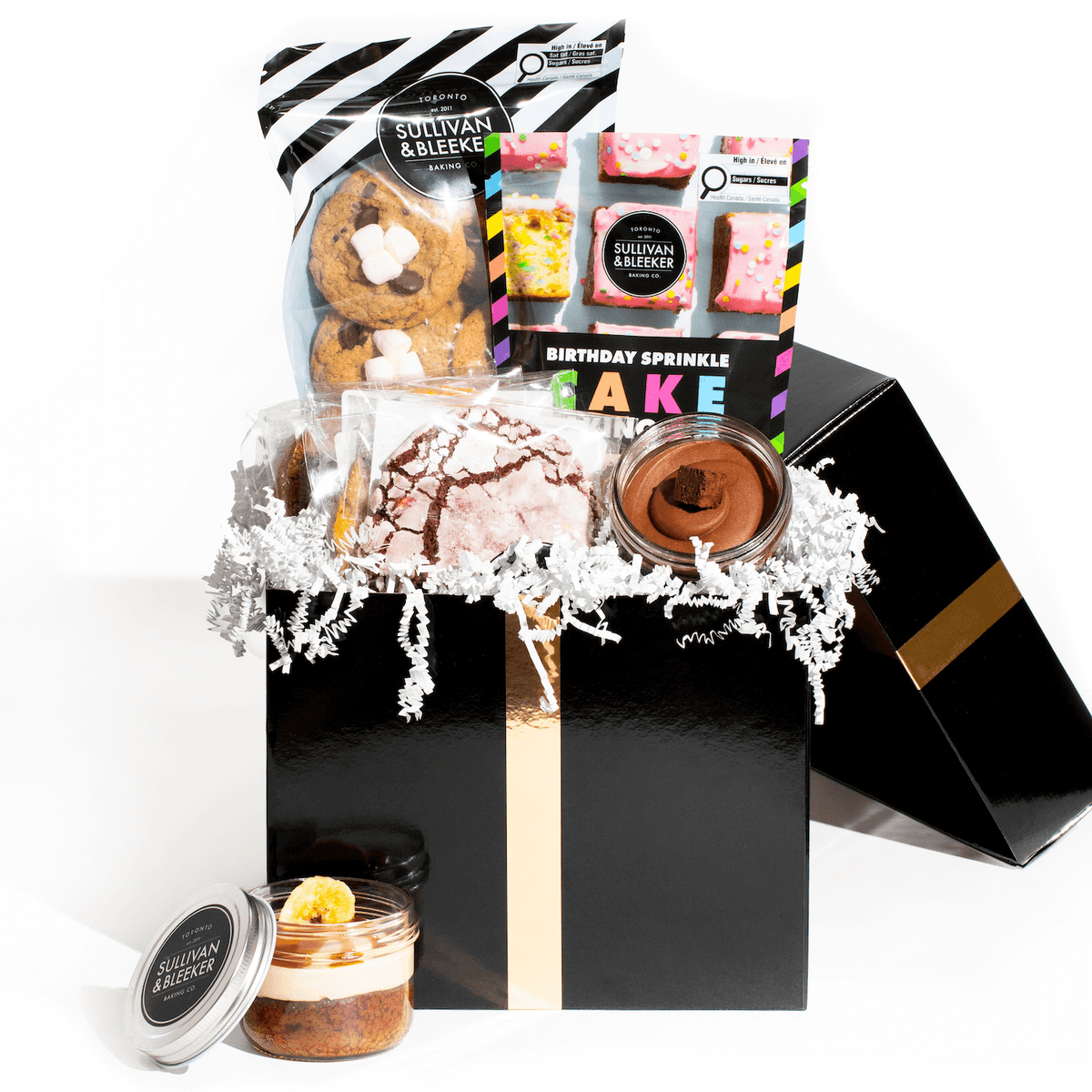 Luxury Cookie & Cupcake Gift Box (black box) filled with assorted gourmet cookies, Jarcakes, shortbread, and a mix kit for delivery in Toronto.