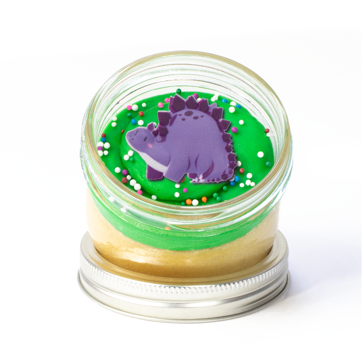 Dinosaur Jarcake (Mini/Regular sizes) in a jar with personalized sticker option, themed frosting, and dinosaur ring for nut-free delivery in Toronto.