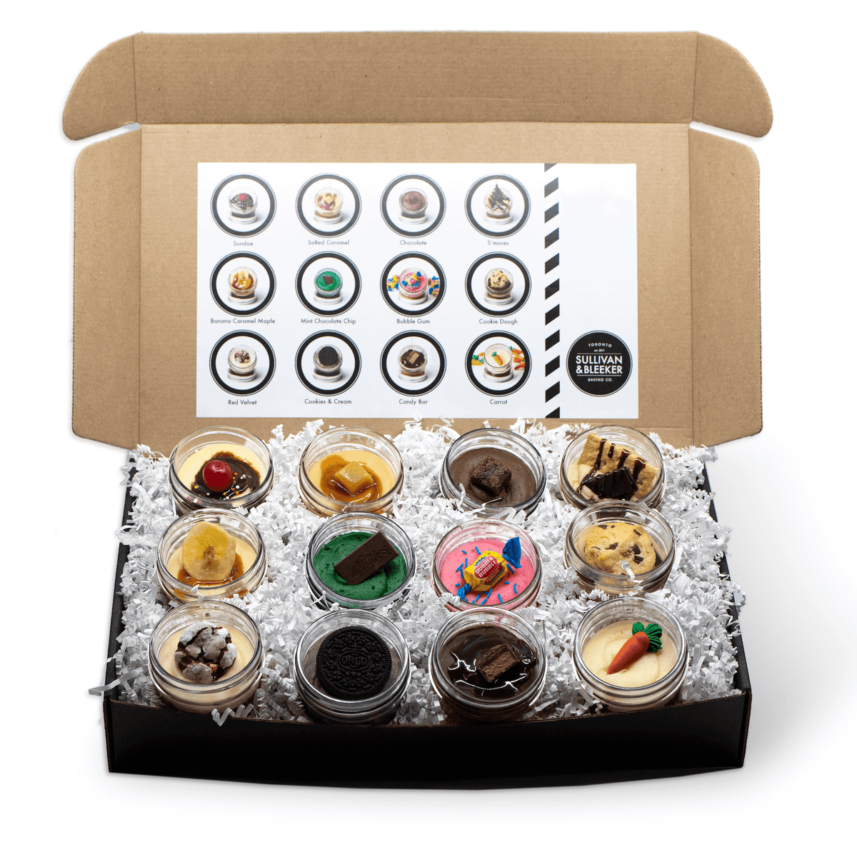 The Dirty Dozen of Jars 12 pack of assorted nut-free Jarcakes ready-to-eat in a consumer party box.
