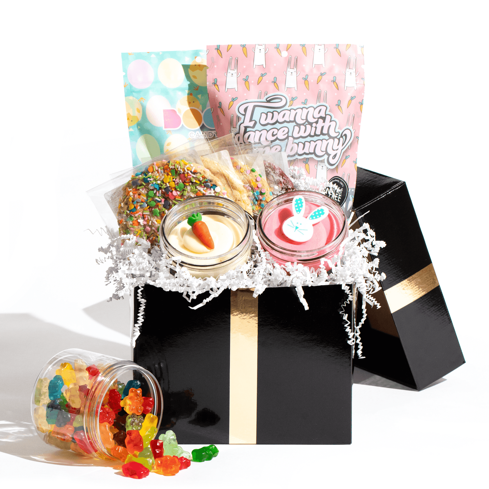 The Easter Essentials gift box overflowing with assorted nut-free cookies and bright spring candies for delivery in Toronto.