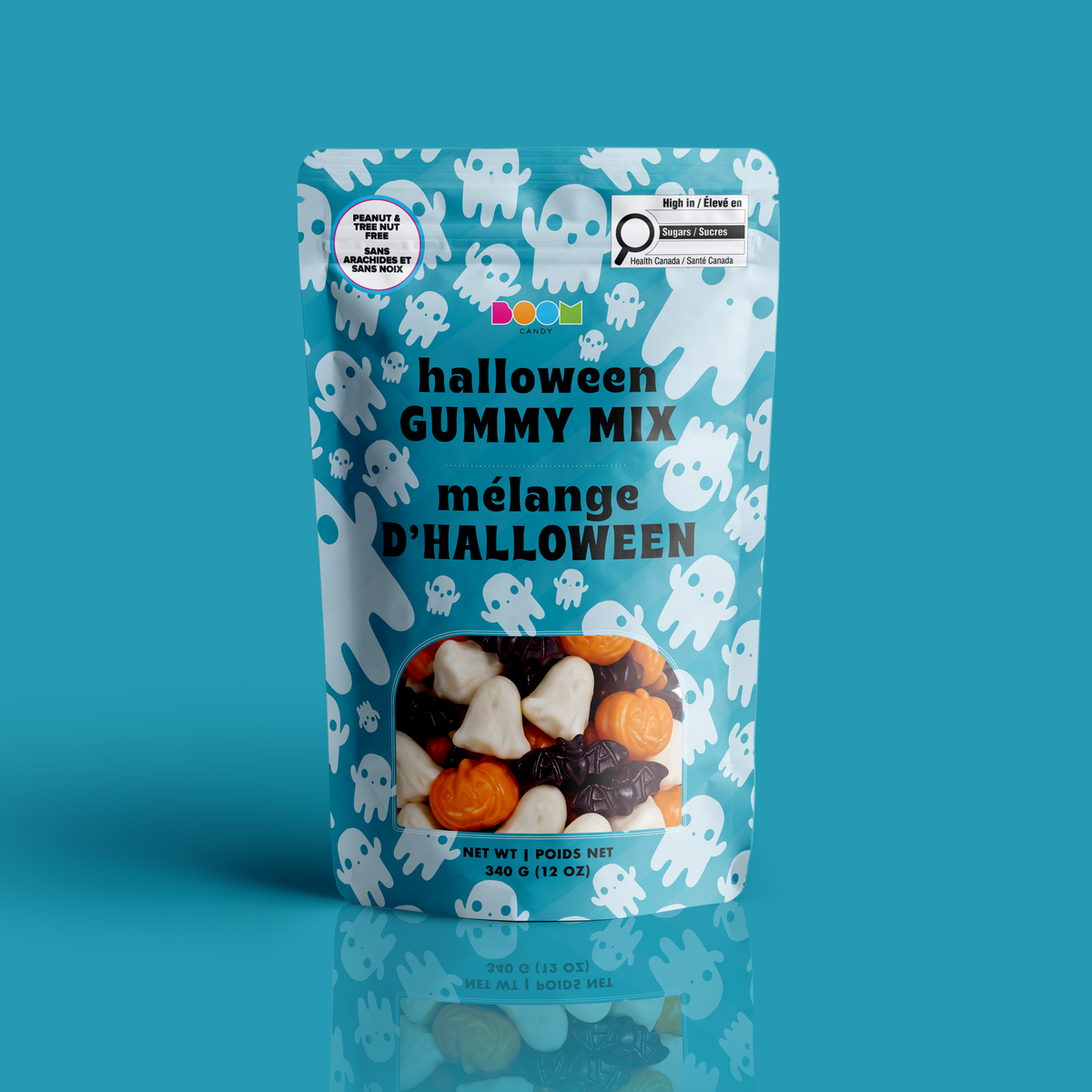 A bag of ghost, pumpkin, and bat shape gummies in a blue ghost pattern Halloween pouch, certified 100% peanut and tree nut free.