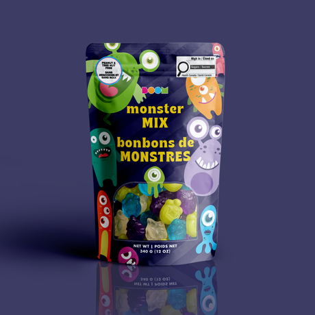 A bag of colourful monster-shaped gummies in a navy pouch with silly cartoon monsters, certified 100% peanut and tree nut free.