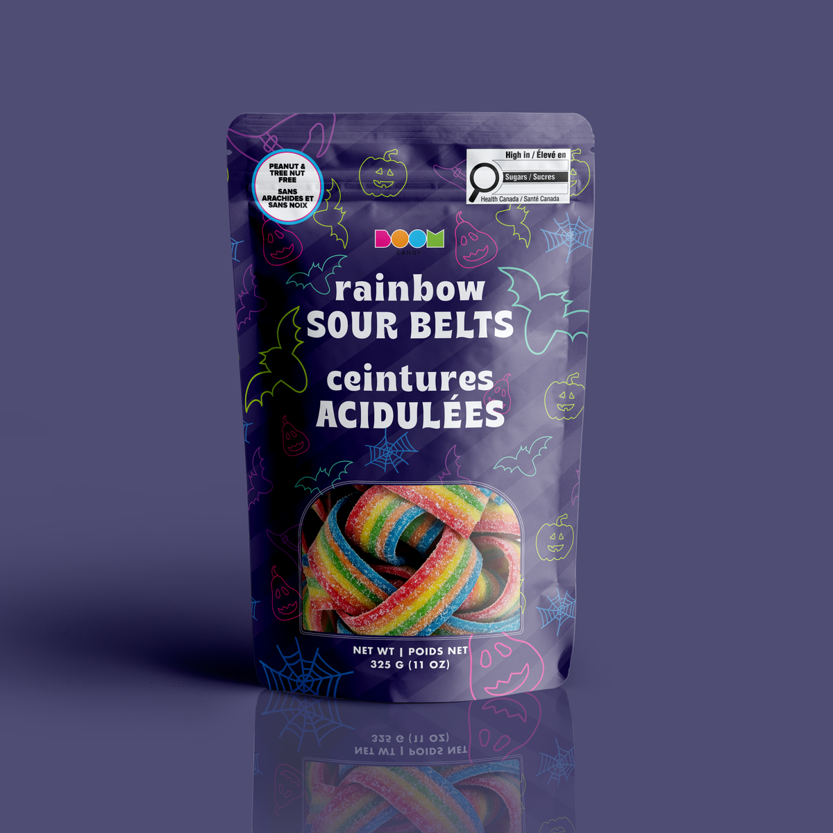 A bag of colourful rainbow sour belts in a purple neon bats and pumpkins Halloween pouch, certified 100% peanut and tree nut free.