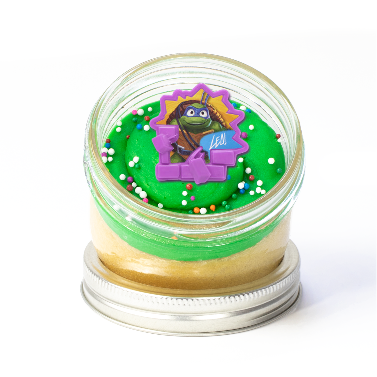 Ninja Turtles Jarcake (Mini/Regular sizes) in a jar with personalized sticker option, green frosting, and TMNT ring for nut-free delivery in Toronto.
