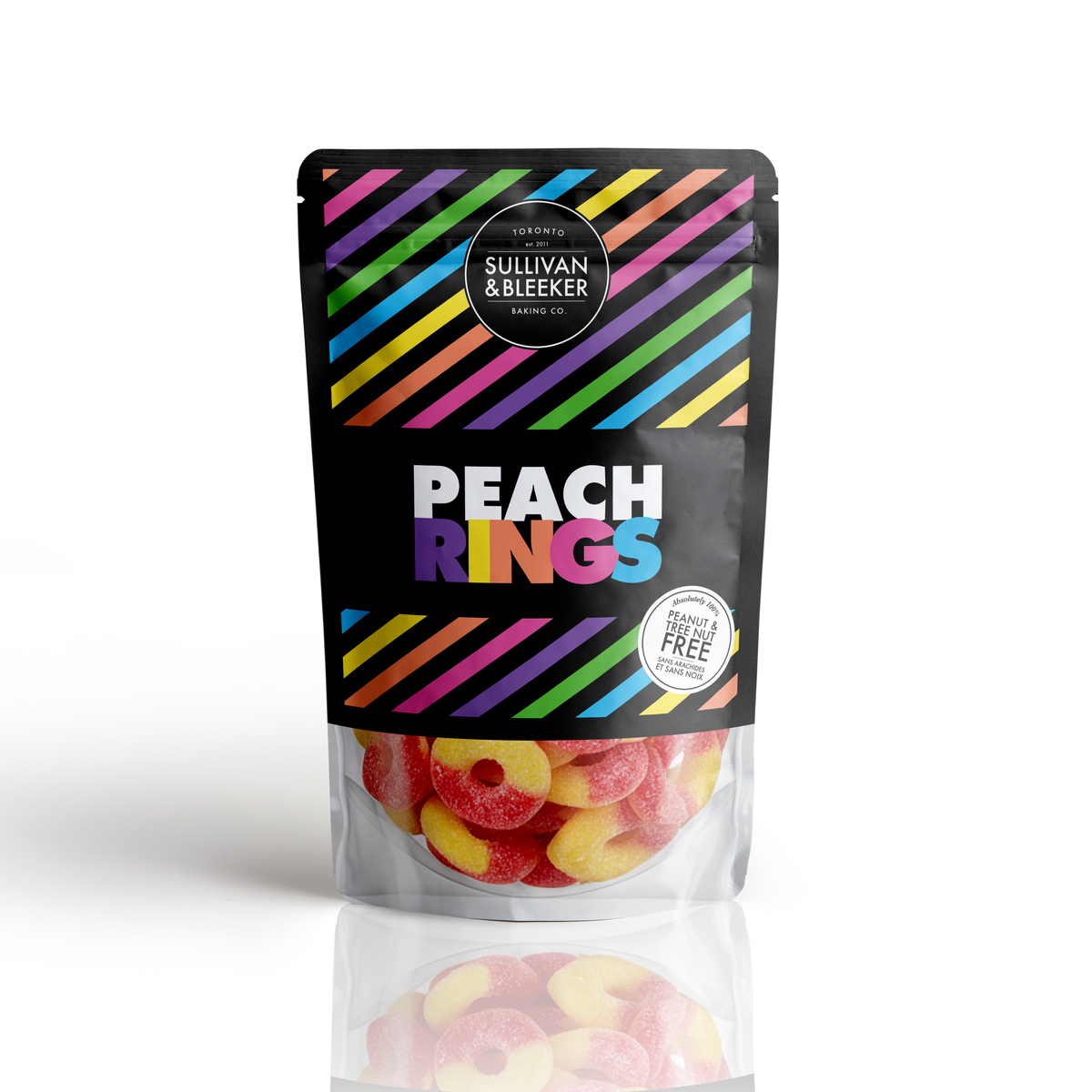 Sullivan & Bleeker Peach Rings Candy Bag featuring sugar-dusted chewy peach ring candies in a 100% peanut and tree nut free pouch.