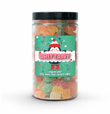 Penguin Candy Jar (6" tall) with custom name and message sticker, filled with nut-free Boom Candy for winter delivery in Toronto.