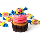 Single Bubble Gum gourmet nut-free cupcake with pink bubble gum frosting, sprinkles, and a piece of bubble gum on top for Toronto delivery.