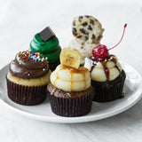 Custom Cupcake Pack assorted nut-free cupcakes in 4, 6, and 12 packs (mini and full size) for custom Toronto orders.	