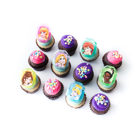 The Princess Dozen 12 pack of licensed nut-free Disney Princess cupcakes for birthday party Toronto delivery.	