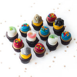 The Star Wars Dozen 12 pack of licensed nut-free cupcakes with Darth Vader and Yoda for birthday party Toronto delivery.	