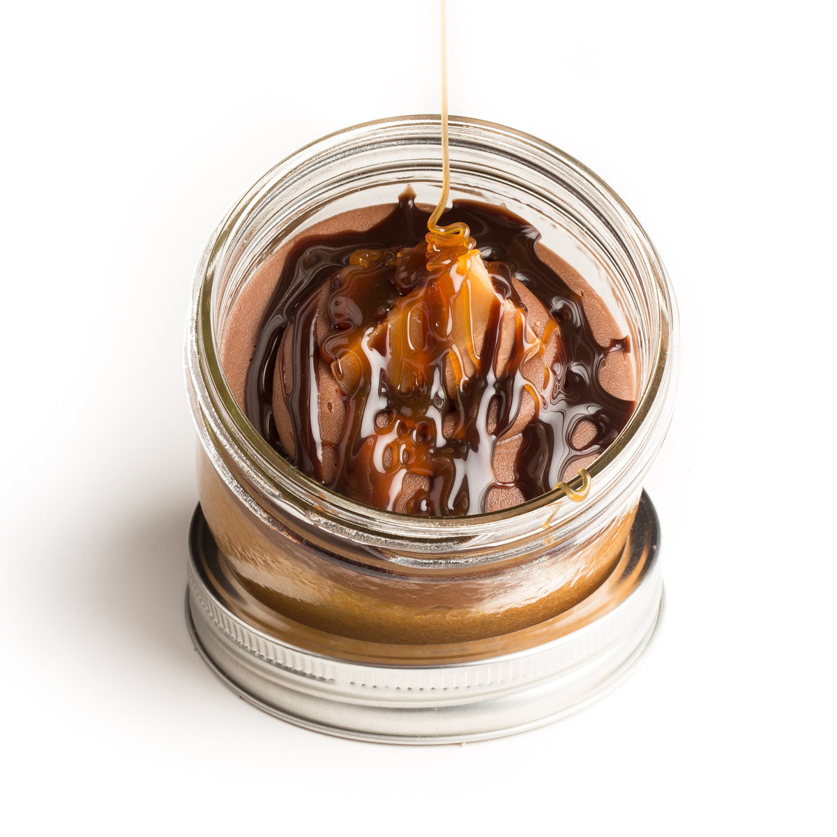 Candy Bar Jarcake (available in Mini/Regular sizes) in a jar with personalized sticker option, chocolate frosting, caramel, and nougat for nut-free delivery in Toronto.