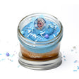 Frozen Jarcake (Mini/Regular sizes) in a jar with personalized sticker option, blue frosting, and Elsa/Anna ring for nut-free delivery in Toronto.