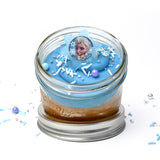 Frozen Jarcake (Mini/Regular sizes) in a jar with personalized sticker option, blue frosting, and Elsa/Anna ring for nut-free delivery in Toronto.