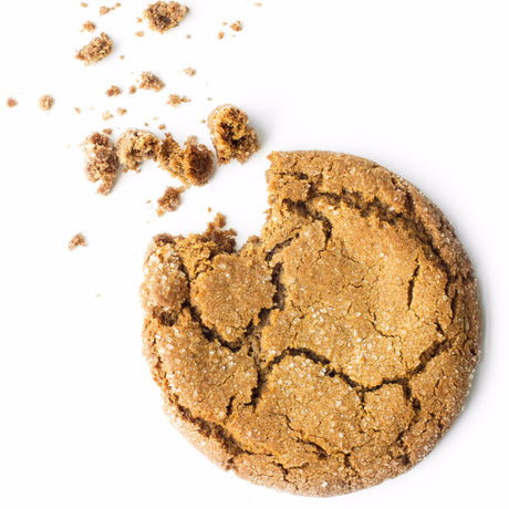Single soft-chewy Ginger Molasses nut-free cookie, individually wrapped, with crunchy sugar coating for a treat in Toronto.