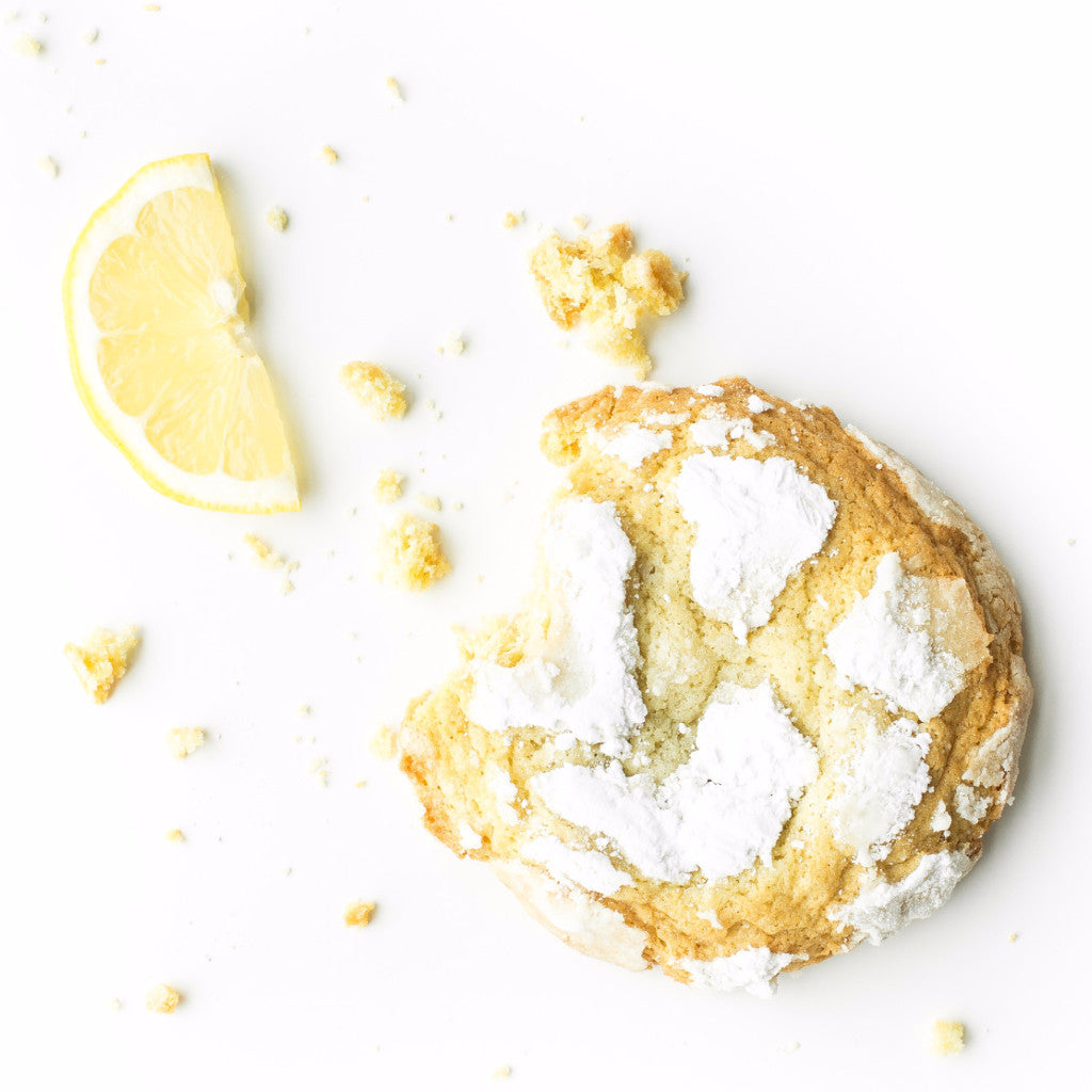 Single soft-baked Lemon nut-free cookie, individually wrapped, with fresh lemon zest and light glaze for a treat in Toronto.