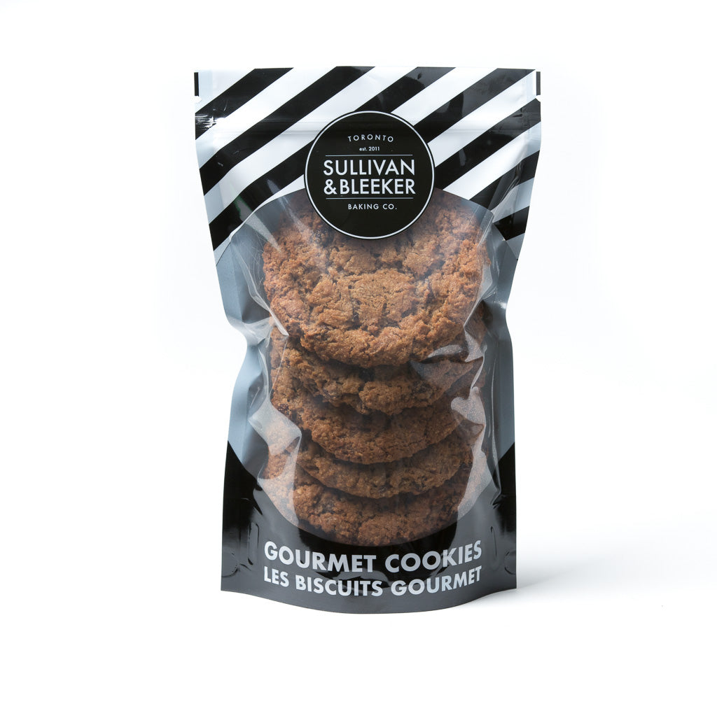 Six-pack of soft-baked Oatmeal Raisin nut-free cookies in a resealable zip-top bag for family treats in Toronto.