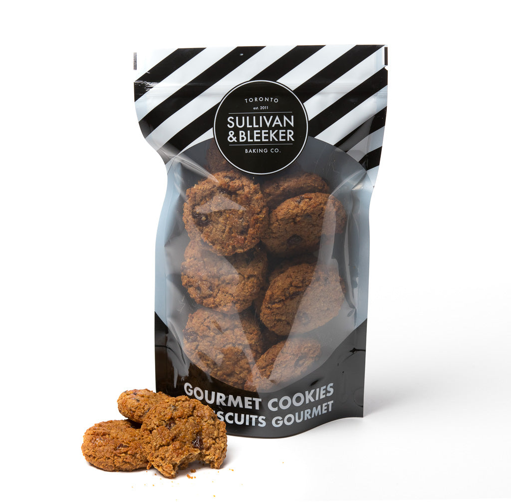 14 Mini soft-baked Oatmeal Raisin nut-free cookies in a resealable zip-top bag, perfect for catering and parties in Toronto.
