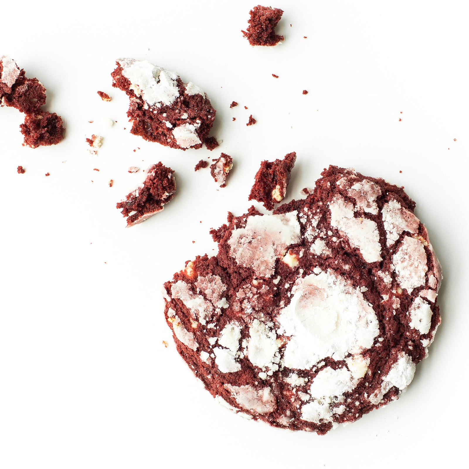 Single soft-baked Red Velvet nut-free cookie, individually wrapped, with white chocolate pieces for a treat or individual gift box delivery in Toronto.