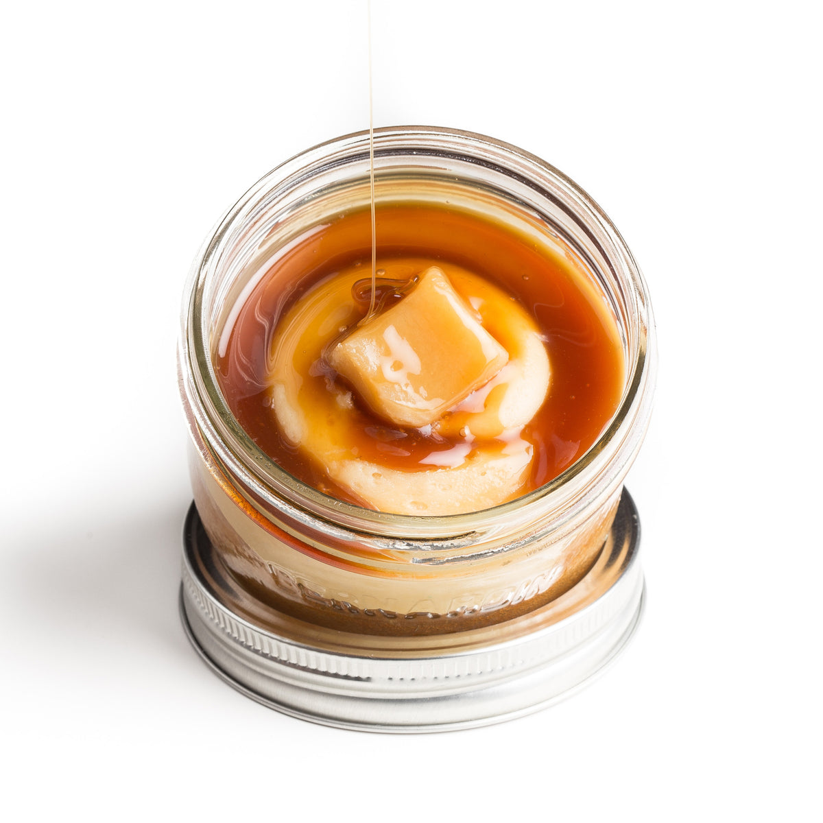 Salted Caramel Jarcake (available in Mini/Regular sizes) in a jar with personalized sticker option, caramel frosting, and drizzle for nut-free delivery in Toronto.