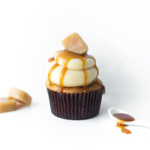 Single Salted Caramel gourmet nut-free cupcake with caramel filling, frosting swirl, and caramel drizzle for Toronto delivery.