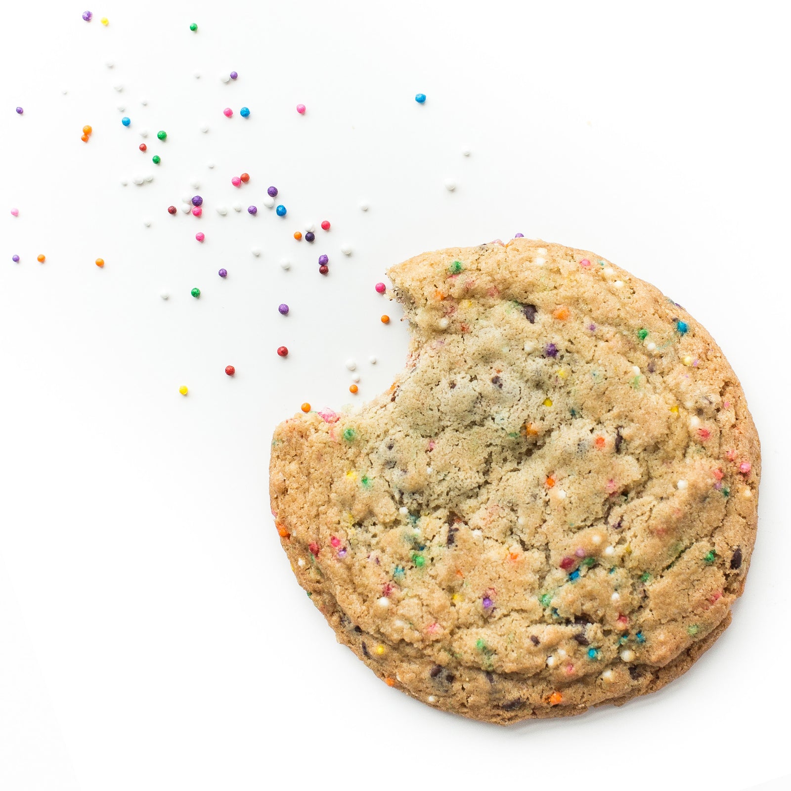 Single soft-baked Sprinkle nut-free cookie, individually wrapped, with chocolate chips and rainbow sprinkles for a treat in Toronto.