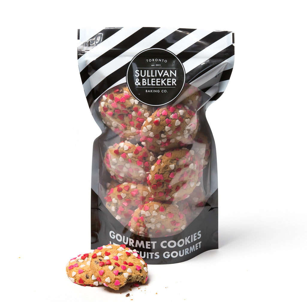 14 Mini soft-baked Valentine's Day nut-free cookies in a resealable zip-top bag, perfect for holiday catering and parties in Toronto.