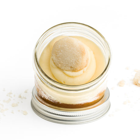 Vanilla Jarcake (Mini/Regular sizes) in a jar with personalized sticker option, vanilla frosting, and shortbread cookie for nut-free delivery in Toronto.