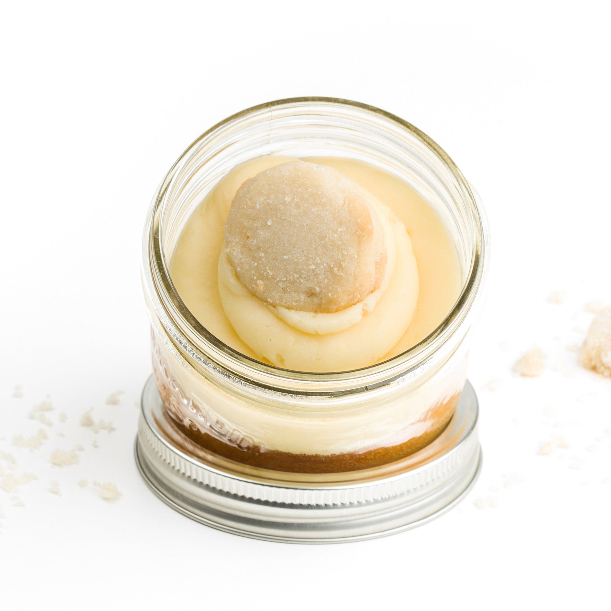 Vanilla Jarcake (Mini/Regular sizes) in a jar with personalized sticker option, vanilla frosting, and shortbread cookie for nut-free delivery in Toronto.